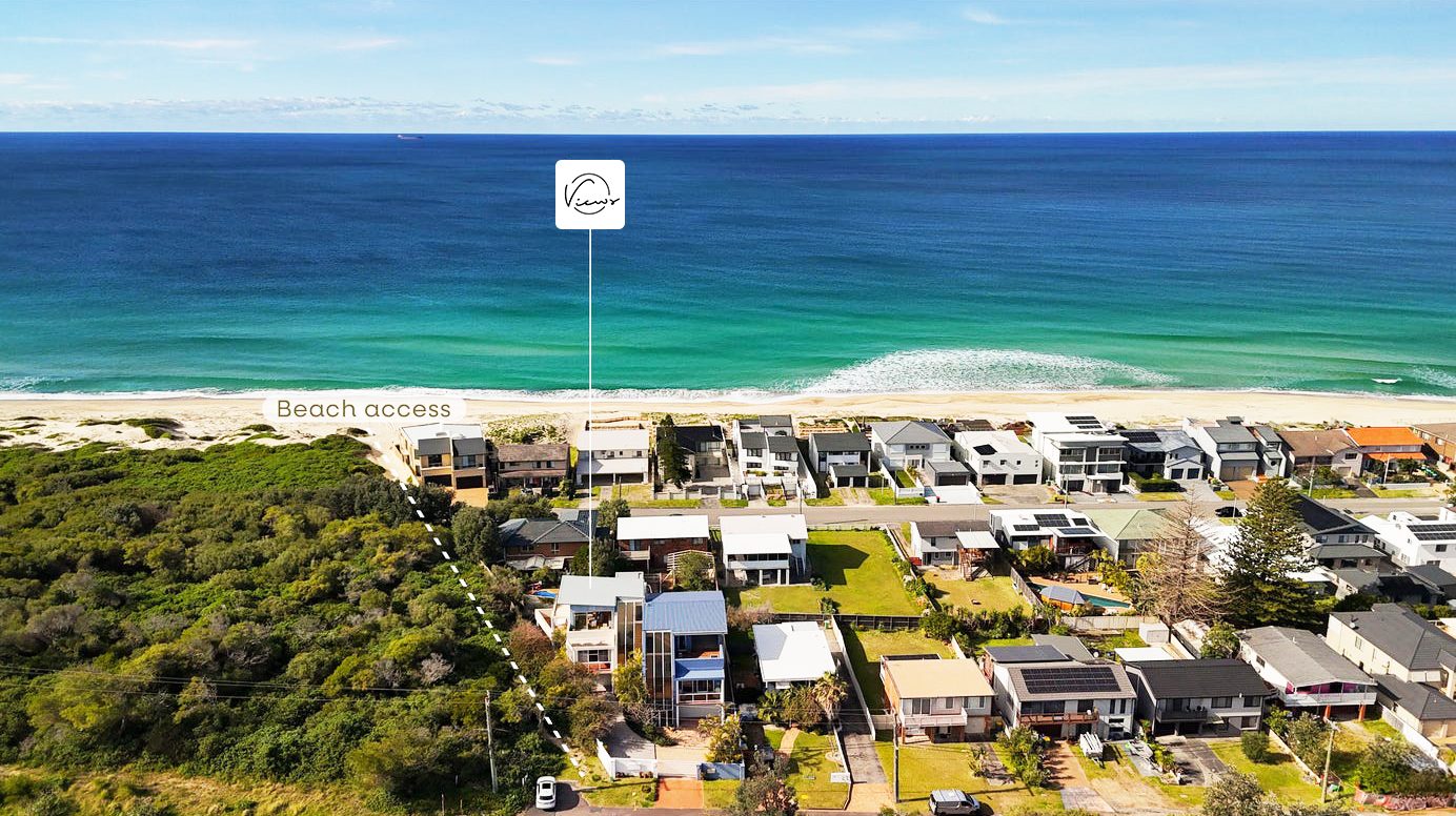 Aerial view of the house with beach access